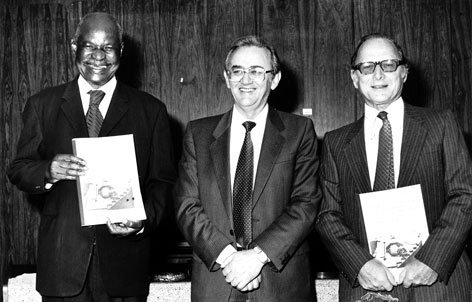 Pelmama Academy Soweto - Clr. F.M. Chuenyane, Chairman of the Pelmama Art, Dance & Music Workshop Trust, Soweto, receiving the Feasibility Report from Prof. Dr P.J. de Lange, part financed by the Anglo American & De Beers Chairman's Fund, Johannesburg, represented by Mr. W. King (at right)
