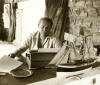 Gordon Vorster working on one of his novels at home (photo  Marianna Christine du Toit Facebook archives) 