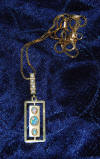Margaret Richardson gold pendant with opal and diamonds on gold chain