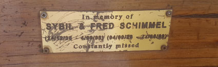 Memorial plaque to Sybil and Fred Schimmel on a bench near the Sabie River